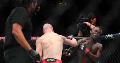 Joe Pyfer and Israel Adesanya in action.