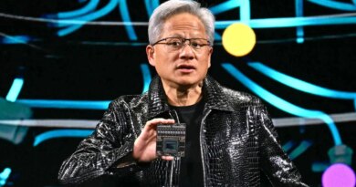 Jensen Huang holds up chip at CES 2025