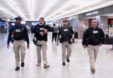 Armed federal agents at an airport