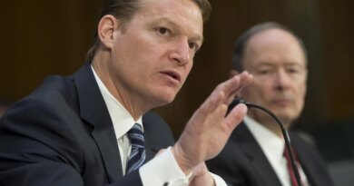 FireEye's chief executive testifying in Congress next to the former NSA director.