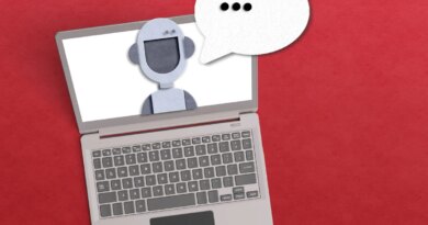 AI agent concept with robot inside a laptop with a voice bubble on red background.