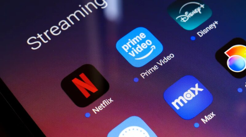 The streaming services Netflix, Amazon Prime Video, Disney Plus, Paramount Plus, Max, and Discovery Plus app appear on the screen of a smartphone