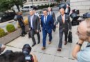 Trevor Milton, founder of Nikola Corp., center, exits court in New York, US