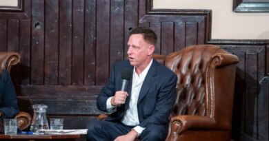 Peter Thiel warned AI is coming for 'math people before word people.' Banks have already said smaller headcounts are possible | Fortune