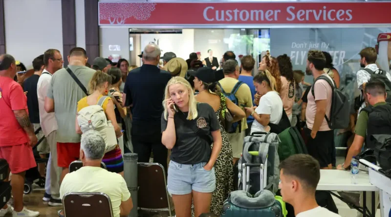 Photos show chaos at airports as passengers are left stranded due to canceled flights