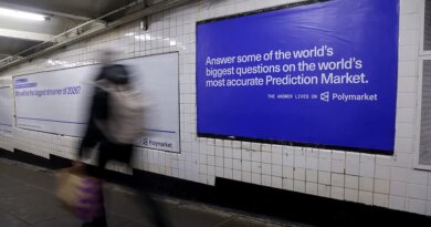 A Polymarket advertisement in a subway station in New York, US, on Thursday, Feb. 5, 2026. Kalshi and Polymarket, which have been assailed by critics for encouraging financial risk taking by making betting more accessible, are now using the promise of free groceries to win over New Yorkers.