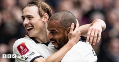 Ben Waine celebrates with Funso Ojo