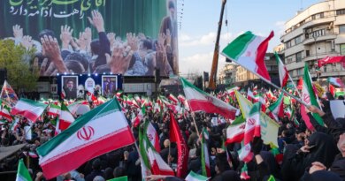 Demonstrators wave Iranian national flags as they gather for a rally in support of the new Supreme Leader at Enghelab Square in central Tehran on March 9, 2026. Iran marked the appointment of Ayatollah Mojtaba Khamenei to replace his father as Supreme Leader after Ayatollah Ali Khamenei was killed in joint U.S. and Israeli strikes on February 28.