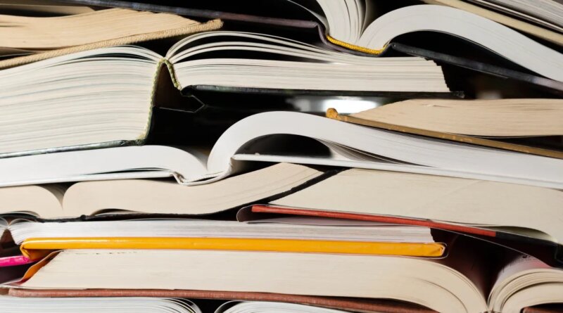 Stack of open books