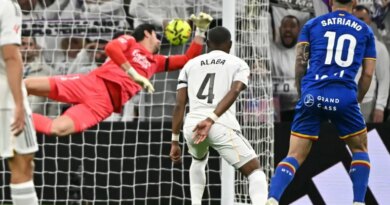 Getafe's Uruguayan forward #10 Martín Satriano scores the opening goal during the Spanish league football match between Real Madrid CF and Getafe CF at Santiago Bernabeu Stadium in Madrid on March 2, 2026. (Photo by Javier SORIANO / AFP)