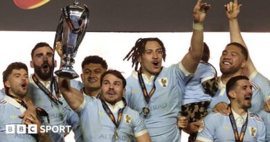 France players lift the Six Nations trophy after the 48-46 win over England