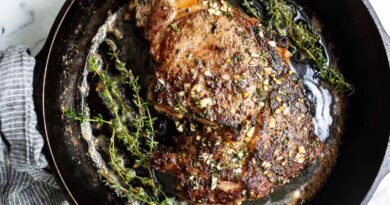 Sizzling Cast Iron Steak with Herbed Butter