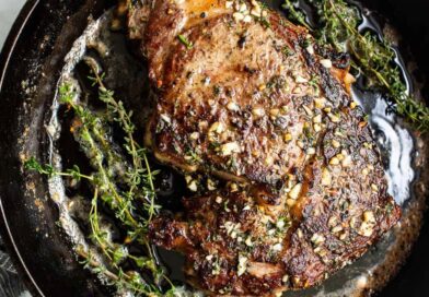 Sizzling Cast Iron Steak with Herbed Butter