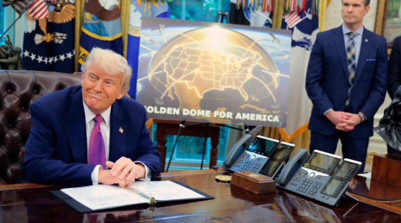 Golden Dome missile program placard with Trump sitting at desk