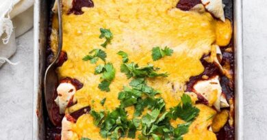 pan of enchiladas with cheese on top