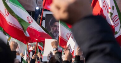 Iranian men shout anti-U.S. and anti-Israeli slogans in front of a portrait of Iran's new Supreme Leader, Ayatollah Mojtaba Khamenei, the son of the late Leader Ayatollah Ali Khamenei, during a rally to pledge allegiance to Mojtaba Khamenei amid the U.S.-Israeli military campaign in Tehran, Iran, on March 9, 2026.