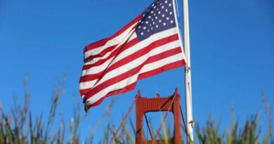 An American flag near the Golden Gate Bridge in San Francisco, California.