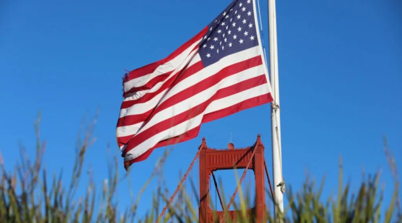 An American flag near the Golden Gate Bridge in San Francisco, California.