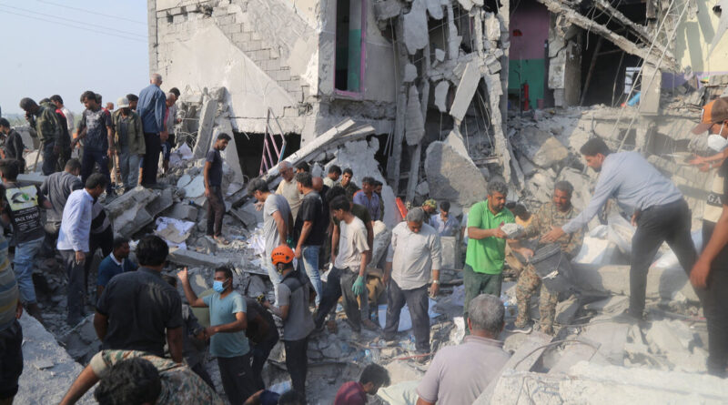 US says it wouldn't deliberately target a school after Iran said over 160 killed in strike