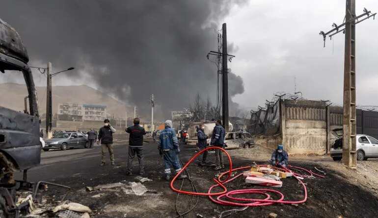 TEHRAN, IRAN - MARCH 8: Smoke billows after overnight airstrikes on oil depots on March 8, 2026 in Tehran, Iran. The United States and Israel continued their joint attack on Iran that began on February 28. Iran retaliated by firing waves of missiles and drones at Israel, and targeting U.S. allies in the region. (Photo by Majid Saeedi/Getty Images)