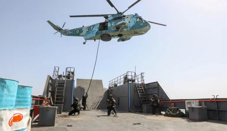 Members of the Iranian Army attend the joint Navy exercise of Iran and Russia in southern Iran, in this handout image obtained on February 19, 2026. Iranian Army/WANA (West Asia News Agency)/Handout via REUTERS ATTENTION EDITORS - THIS PICTURE WAS PROVIDED BY A THIRD PARTY. TPX IMAGES OF THE DAY
