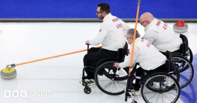 Austin McKenzie delivers a stone supported by Karen Aspey and Stewart Pimblett