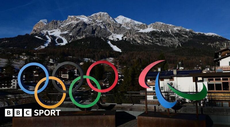 A picture showing the logo of Milano Cortina 2026 Olympic and Paralympic Games with the Women's Alpine skiing Olympia delle Tofane slope in the background in the distance in Cortina d'Ampezzo.
