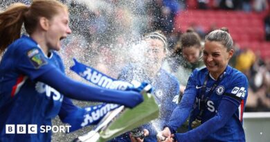 Chelsea players celebrate winning the Women's League Cup at Ashton Gate