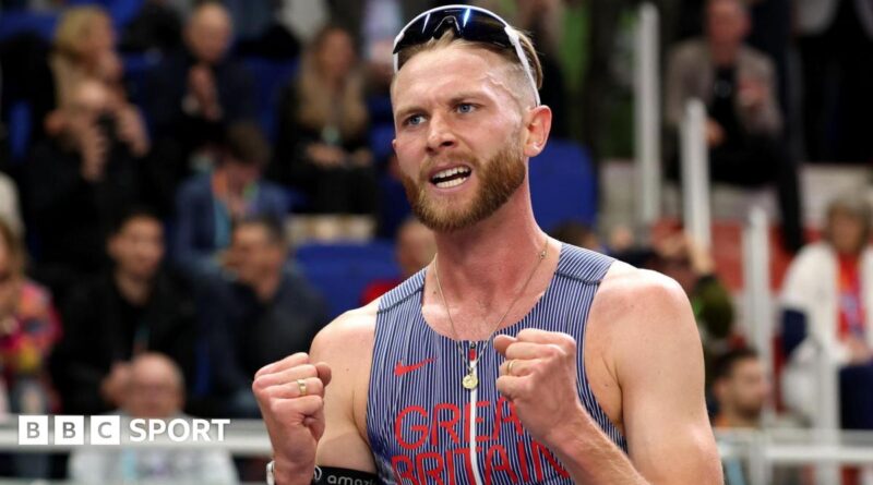 Josh Kerr celebrates winning world indoor 3,000m gold