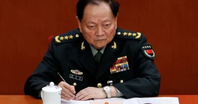 FILE PHOTO: FILE PHOTO: Central Military Commission Vice Chairman Zhang Youxia attends the second plenary session of the National People's Congress (NPC), at the Great Hall of the People in Beijing, China March 8, 2025. REUTERS/Tingshu Wang/File Photo/File Photo