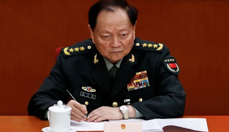 FILE PHOTO: FILE PHOTO: Central Military Commission Vice Chairman Zhang Youxia attends the second plenary session of the National People's Congress (NPC), at the Great Hall of the People in Beijing, China March 8, 2025. REUTERS/Tingshu Wang/File Photo/File Photo