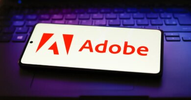 The Adobe Inc. logo displayed on a smartphone screen.
