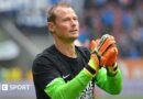 Alex Manninger claps his hands
