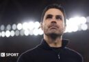 Mikel Arteta with lights behind him
