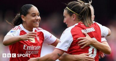 Olivia Smith nicks ball away from Lyon goalkeeper Christiane Endler