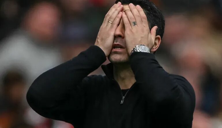 Arsenal's Spanish manager Mikel Arteta reacts during the English Premier League football match between Arsenal and Bournemouth at the Emirates Stadium in London on April 11, 2026. (Photo by Glyn KIRK / AFP) / RESTRICTED TO EDITORIAL USE. No use with unauthorized audio, video, data, fixture lists, club/league logos or 'live' services. Online in-match use limited to 120 images. An additional 40 images may be used in extra time. No video emulation. Social media in-match use limited to 120 images. An additional 40 images may be used in extra time. No use in betting publications, games or single club/league/player publications. /