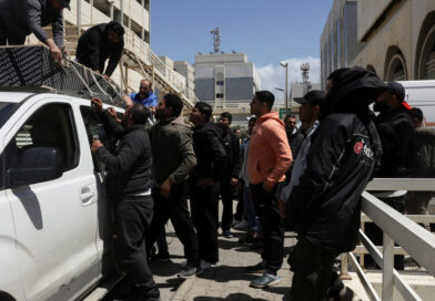 At Beirut hospital, grieving families identify mangled bodies after Israeli strikes