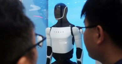 Elon Musk says copycats are to blame for pushing Tesla's Optimus humanoid robot unveiling