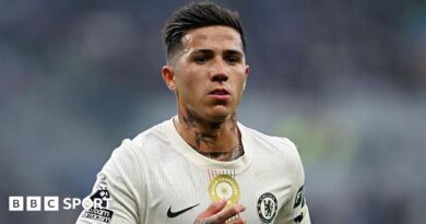 Enzo Fernandez wearing a white Chelsea shirt