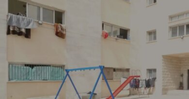 Vacant swings and slides at a school in the Lebanese Mountains.