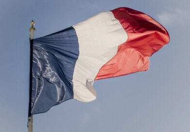 Photo illustration of the blue white and red French flag at the Elysee Presidential Palace in Paris France on April 15, 2026.