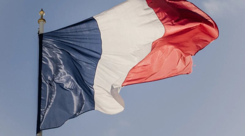 Photo illustration of the blue white and red French flag at the Elysee Presidential Palace in Paris France on April 15, 2026.