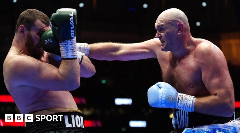 Tyson Fury landing a punch on Arslanbek Makhmudov