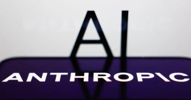 AI sign displayed on a screen and Anthropic logo displayed on a phone screen are seen in this illustration photo.