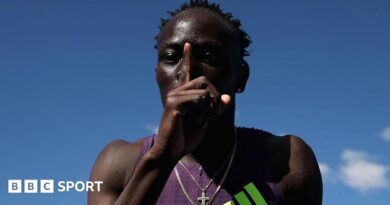 Australian sprinter Gout Gout puts his finger to his lips and makes a '1' sign after his win