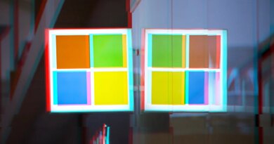 A moshed/glitchy version of a Windows logo on a Microsoft Store front.