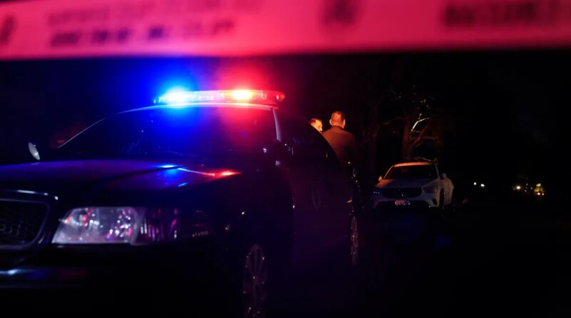 LAPD officers keep watch as the police investigate two people found dead in Rob Reiner's home on December 14, 2025 in Brentwood, California.