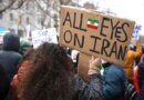 BERLIN, GERMANY - JANUARY 24: A protester holds a banner reading "All eyes on Iran" as people march in a demonstration held under the motto "Help Iran. No Business With The Mullahs" on January 24, 2026 in Berlin, Germany. Iranian officials have acknowledged that over 5,000 people were killed in the recent nationwide street demonstrations following violent suppression by government forces. (Photo by Omer Messinger/Getty Images)