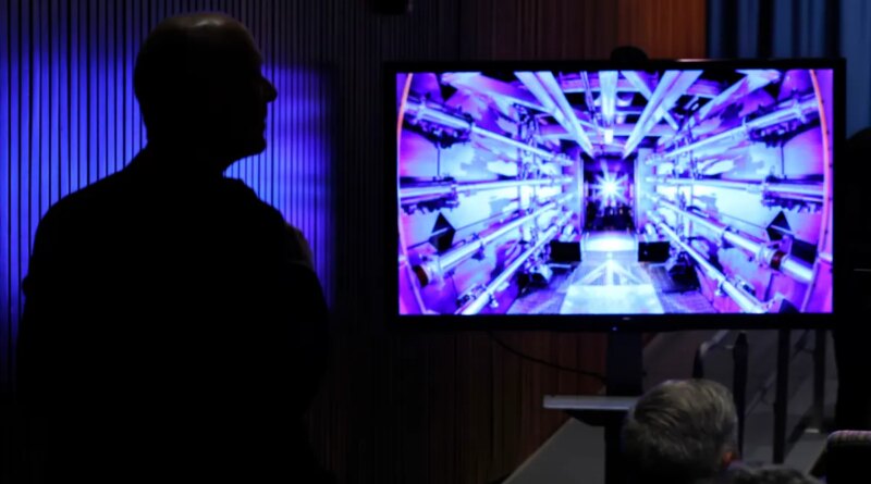 Guests await the beginning of a news conference with U.S. Energy Secretary Jennifer Granholm at the Department of Energy headquarters to announce a breakthrough in fusion research on December 13, 2022 in Washington, DC.