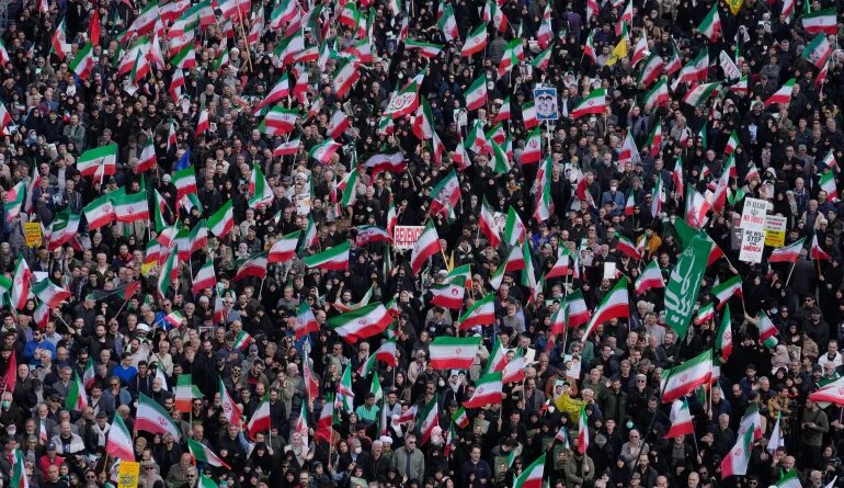 Mourners gather during a funeral procession in Tehran, Iran on April 1, 2026, for Alireza Tangsiri, head of Iran's Islamic Revolutionary Guard Corps Navy, and others killed in Israeli strikes in late March.